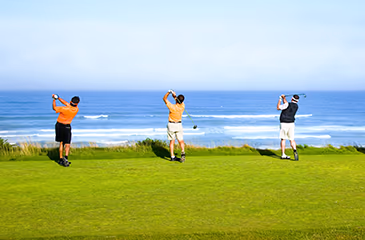 Golfers at Barnbougle Dunes in Tasmania, Australia