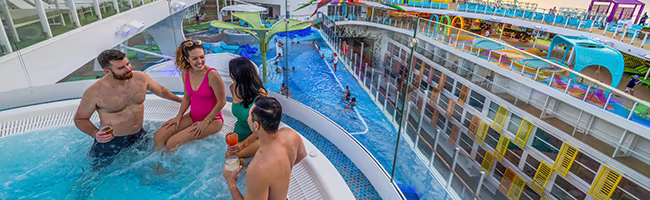 Group of young adults in hot tub on Icon of the Seas
