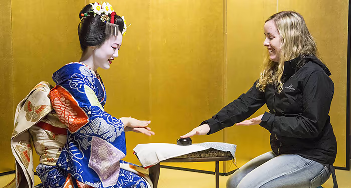 Woman meeting a Geisha