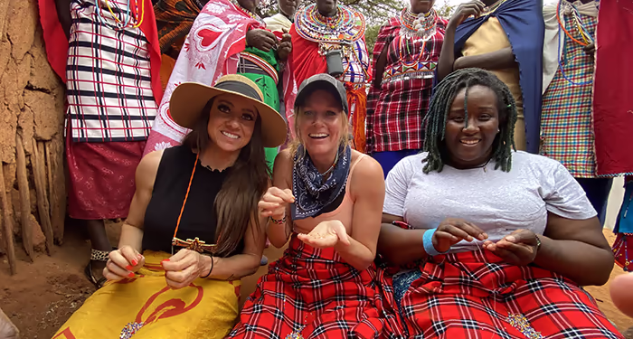 Woman with Masaii Mari villagers