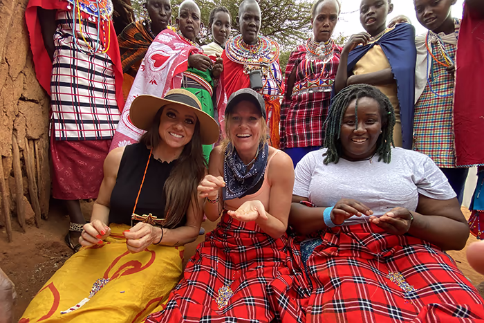 Woman with Masaii Mari villagers
