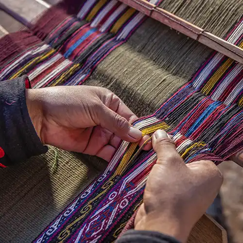 Woman Weaving on a Loom