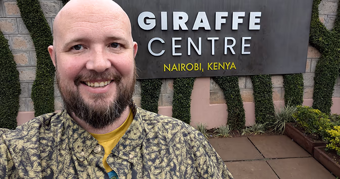 Jeof Oyster at Giraffe Center in Nairobi, Kenya while on safari