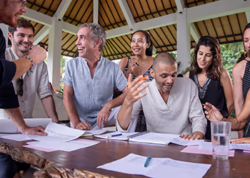 A business team collaborates at an off-site retreat