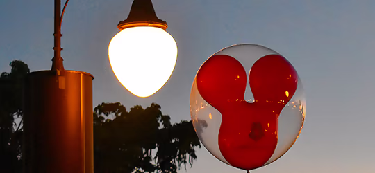 Mickey Balloon by lamp at night