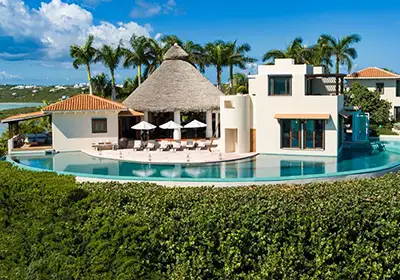 A beautiful villa in Turks & Caicos with a wrap-around infinity pool